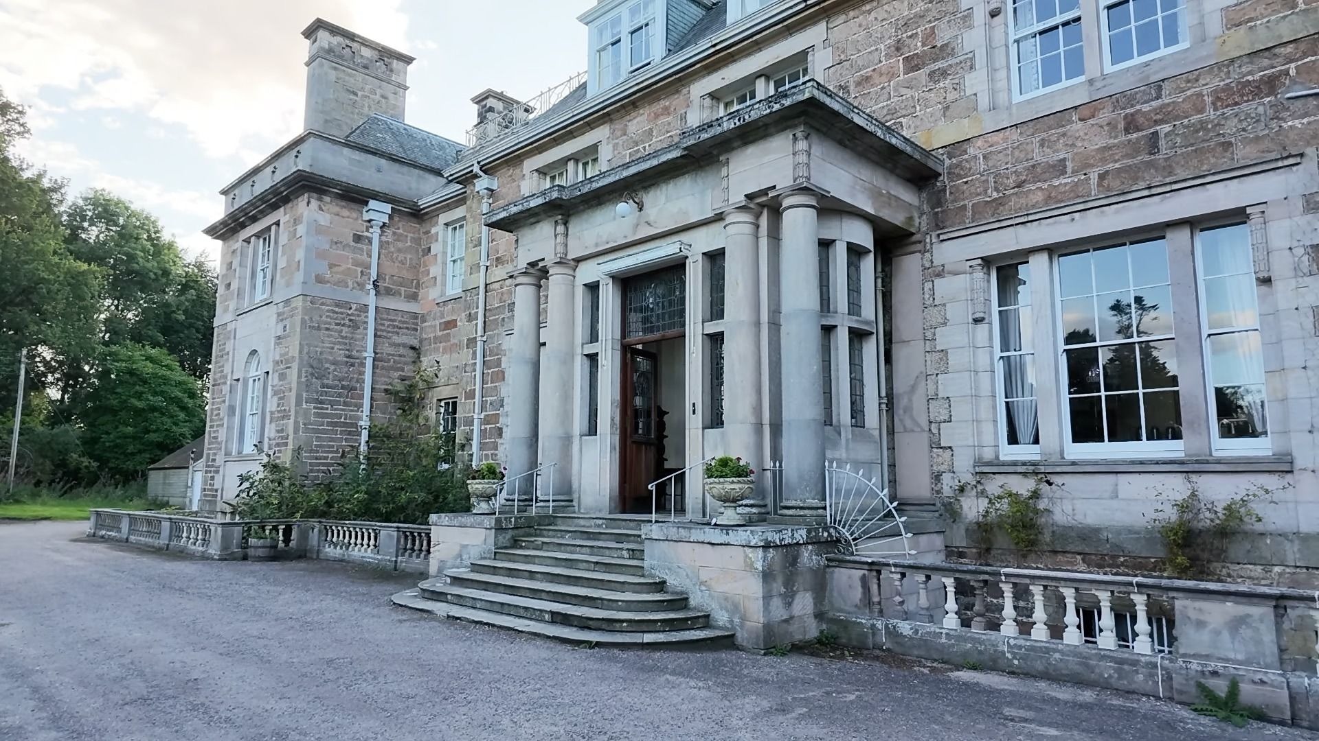 The stone portico entrance of Burgie House near Forres in Moray, a private country house where Giuseppe Manzoli cooks