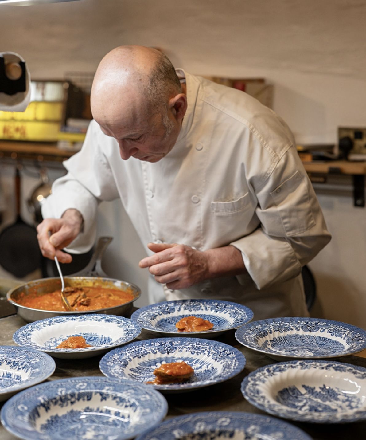 Italian private chef plating dishes for a milestone birthday dinner in Scotland