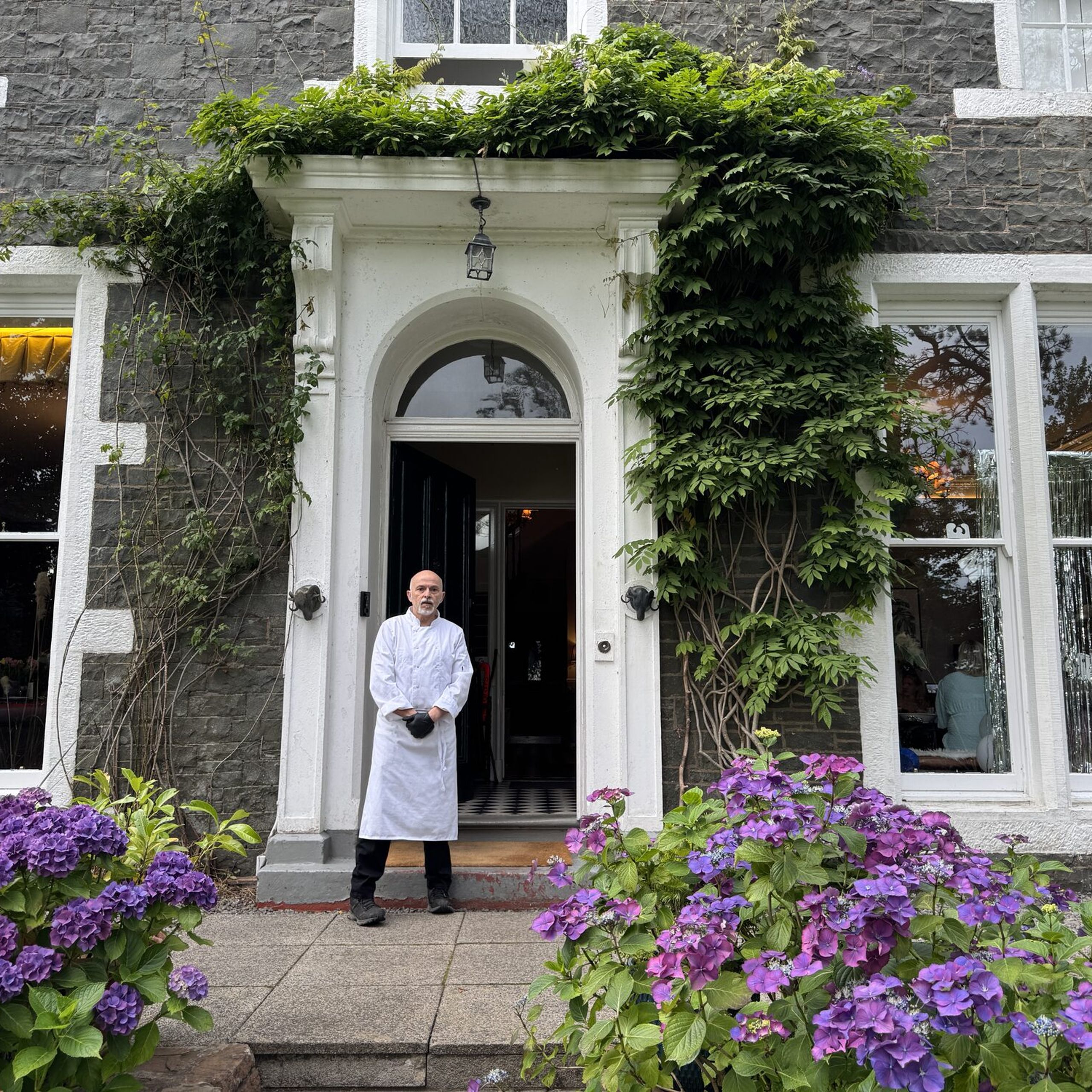 Private chef Giuseppe Manzoli at the front door of Beechwood House, Moffat