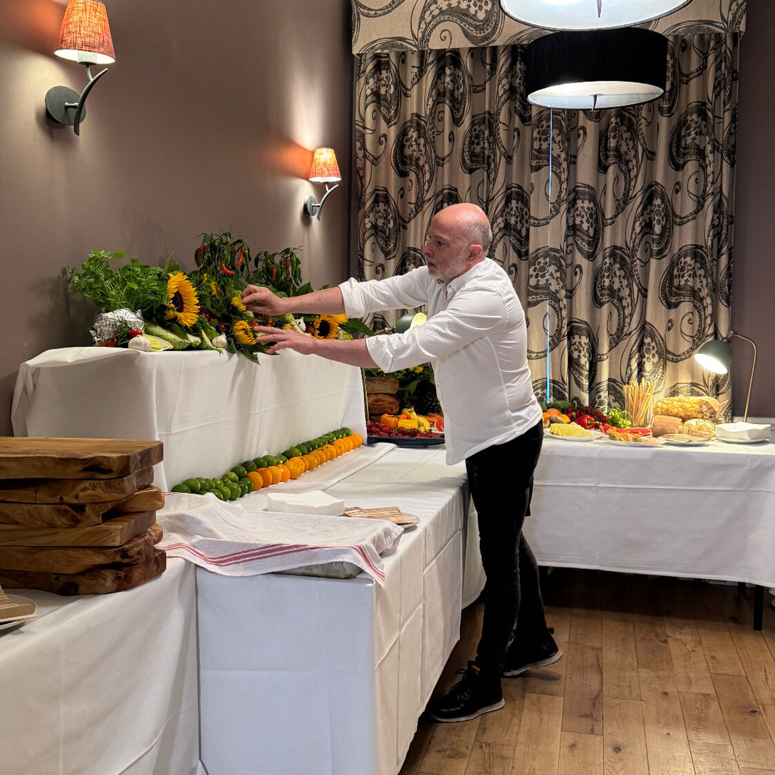 Giuseppe Manzoli preparing a graduation party buffet for 40 guests in St Andrews