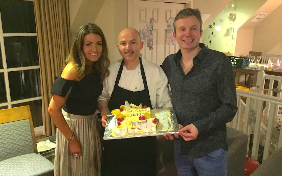 Angela Meet and Tommy with a cake