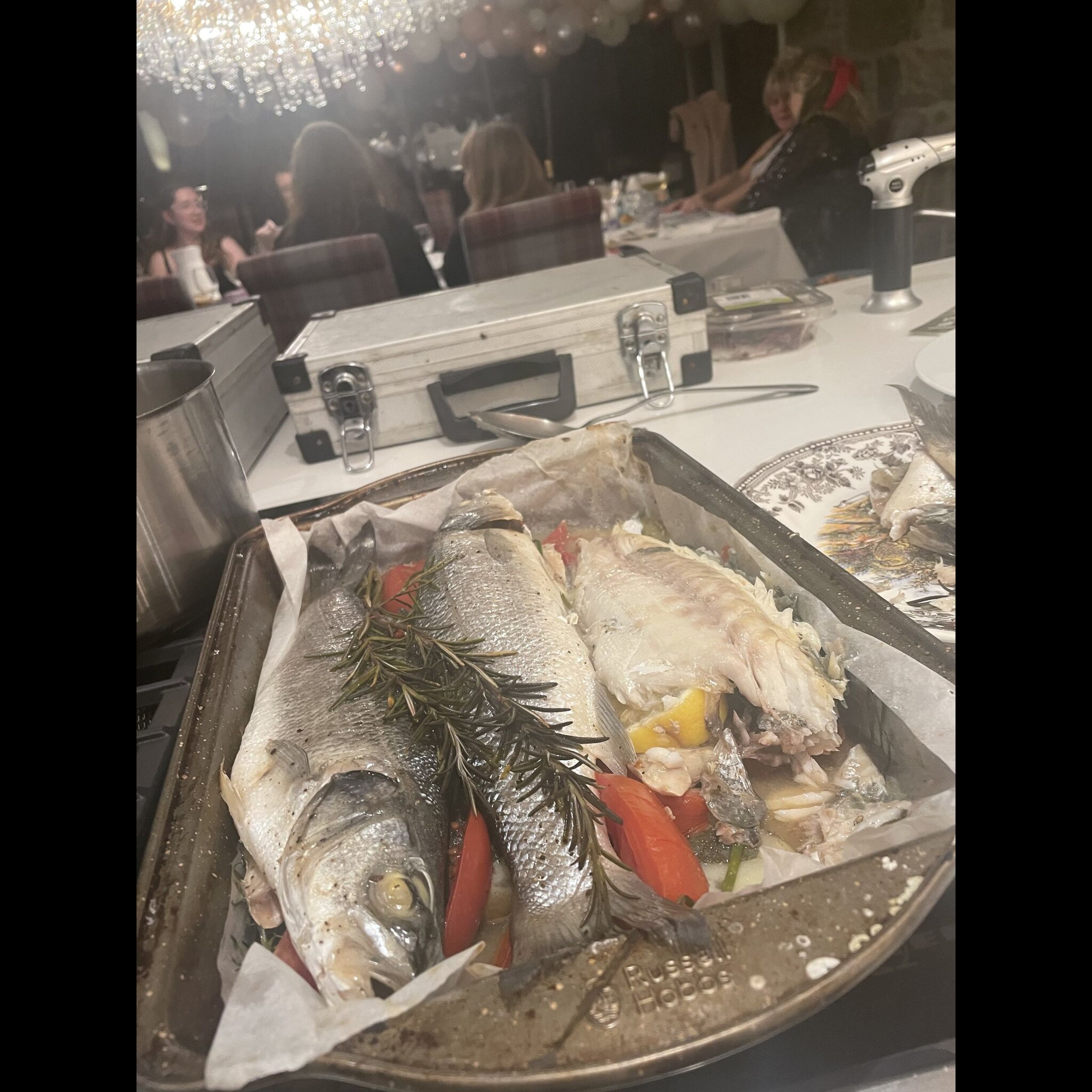 Whole seabass baked with rosemary and lemon for a hen party at Kipney Lodge, Perthshire
